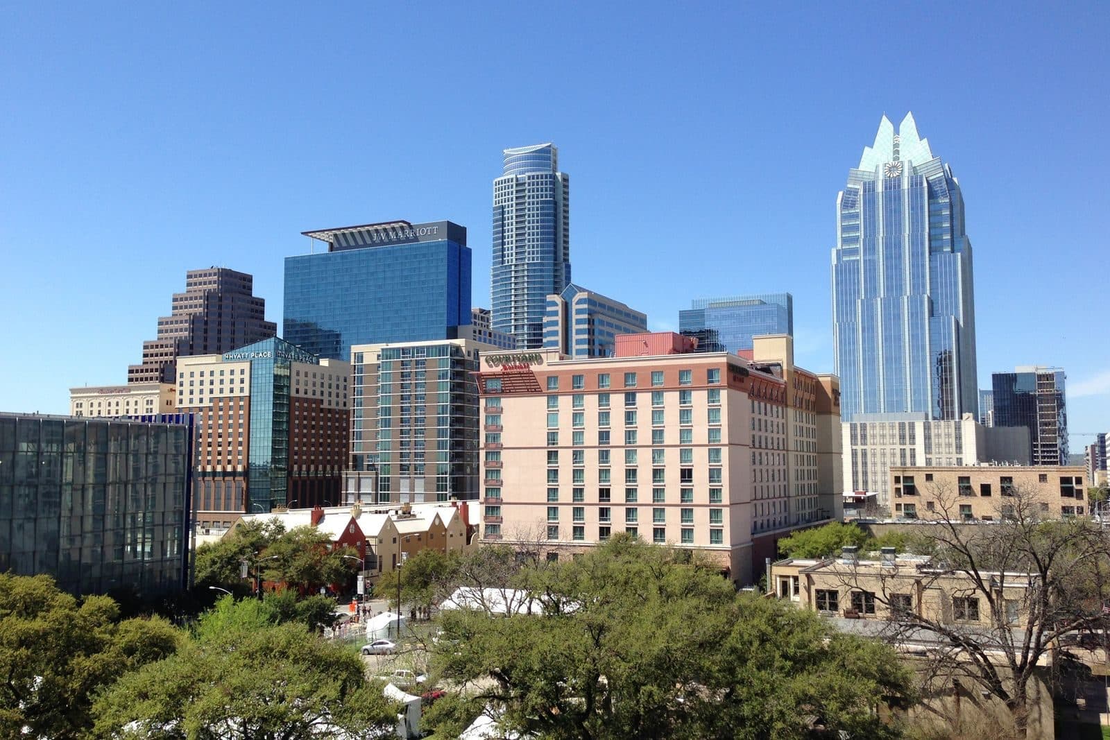 Viewnear's Austin home: a glass office tower in Stonelake Office Park, set against the downtown Austin skyline